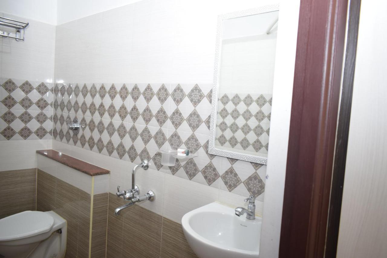 Hôtel E S Residency à Theni Extérieur photo