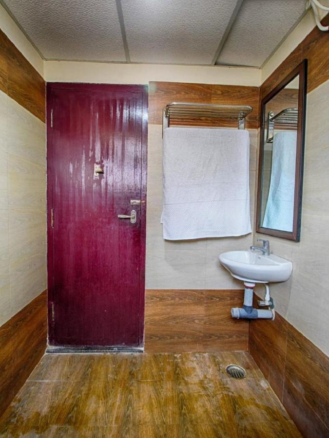 Hôtel E S Residency à Theni Extérieur photo